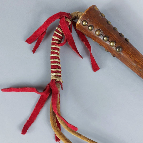Native American Crow Brass Tacked Wooden Quirt with Cochineal Stroud Wrapped Leather Strap