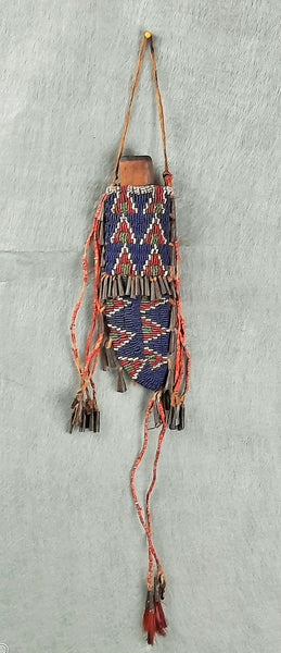 Sioux Knife Sheath   with elaborate multicolored geometric designs on both sides, with Knife