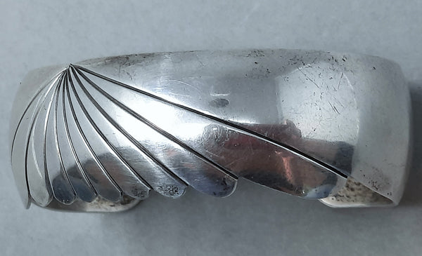Modern Navajo Sterling Silver cuff with Sunburst